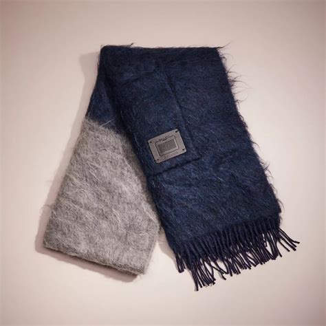 coach scarf with pockets.